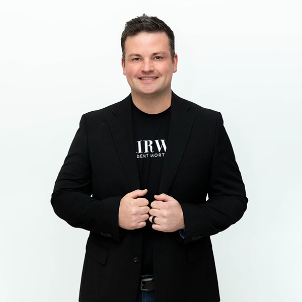 A man posing his outfit